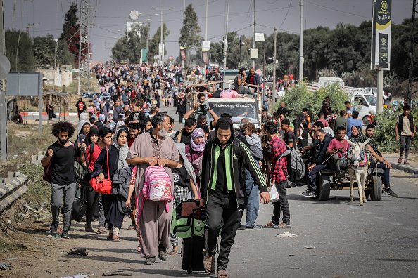 GAZA CITY, GAZA - NOVEMBER 11: Palestinians including injured people leave their homes to escape Israel's bombardments to reach southern part of the city in Gaza City, Gaza on November 11, 2023. (Photo by Belal Khaled/Anadolu via Getty Images)